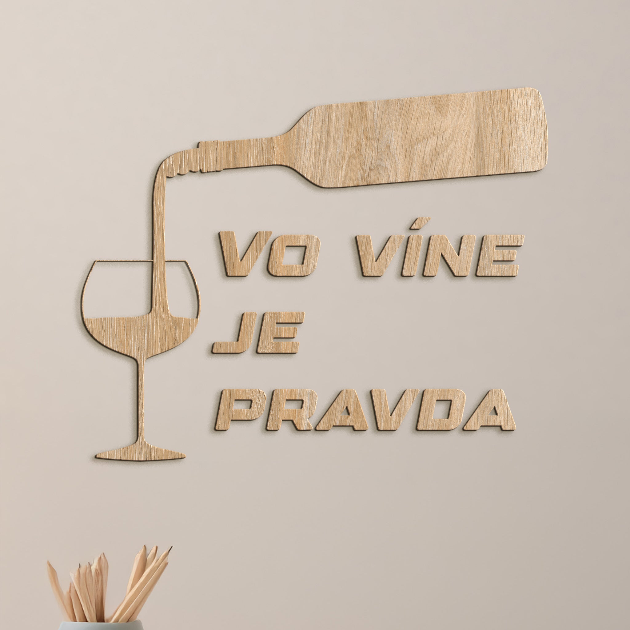 Nápis na stenu s citátom Vo víne je pravda